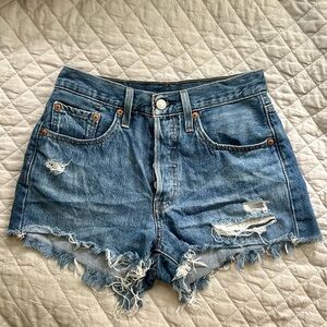501 medium wash levi shorts